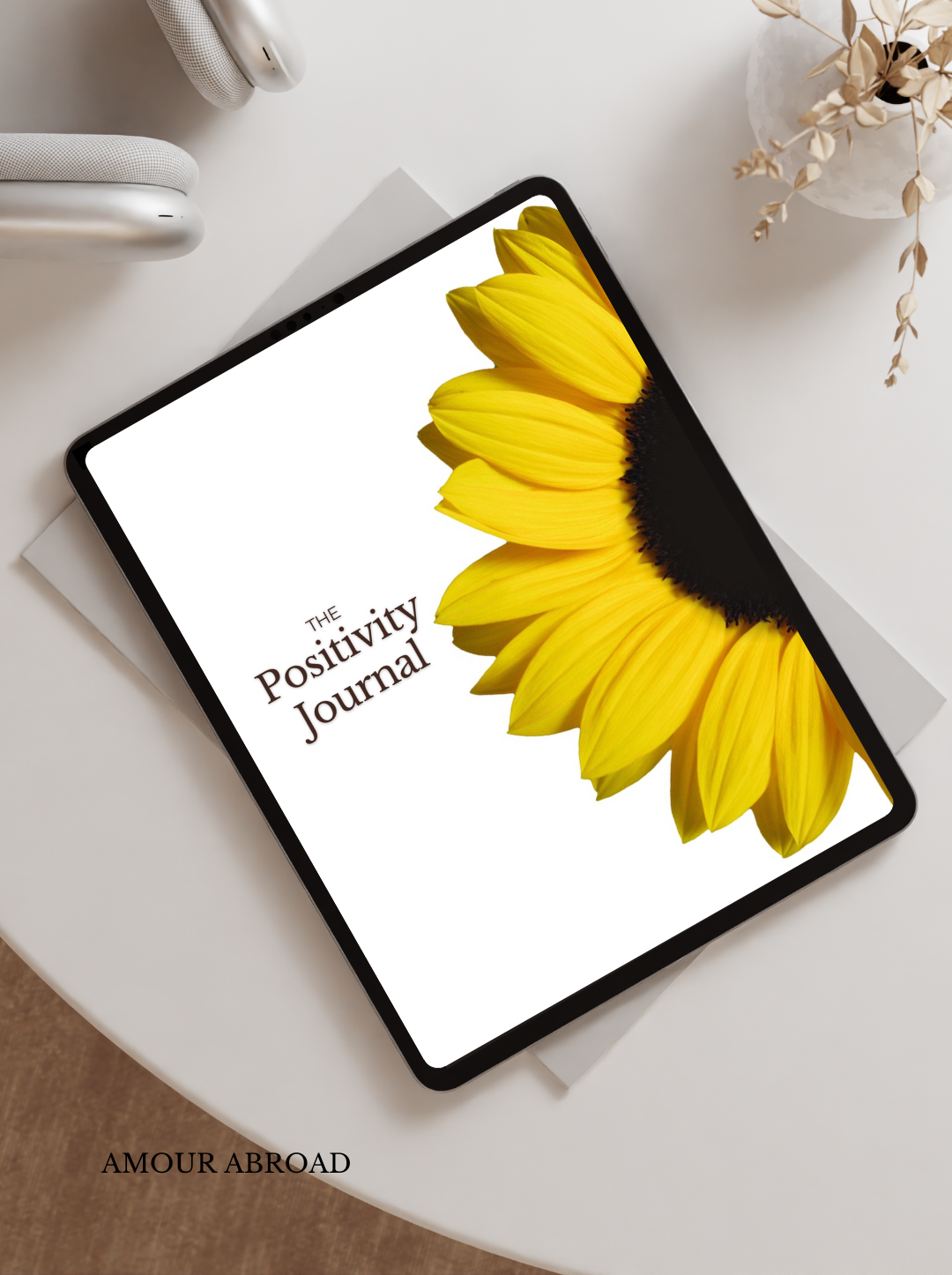 Depicts Amour Abroad's Positivity Journal on Etsy with link to shop.