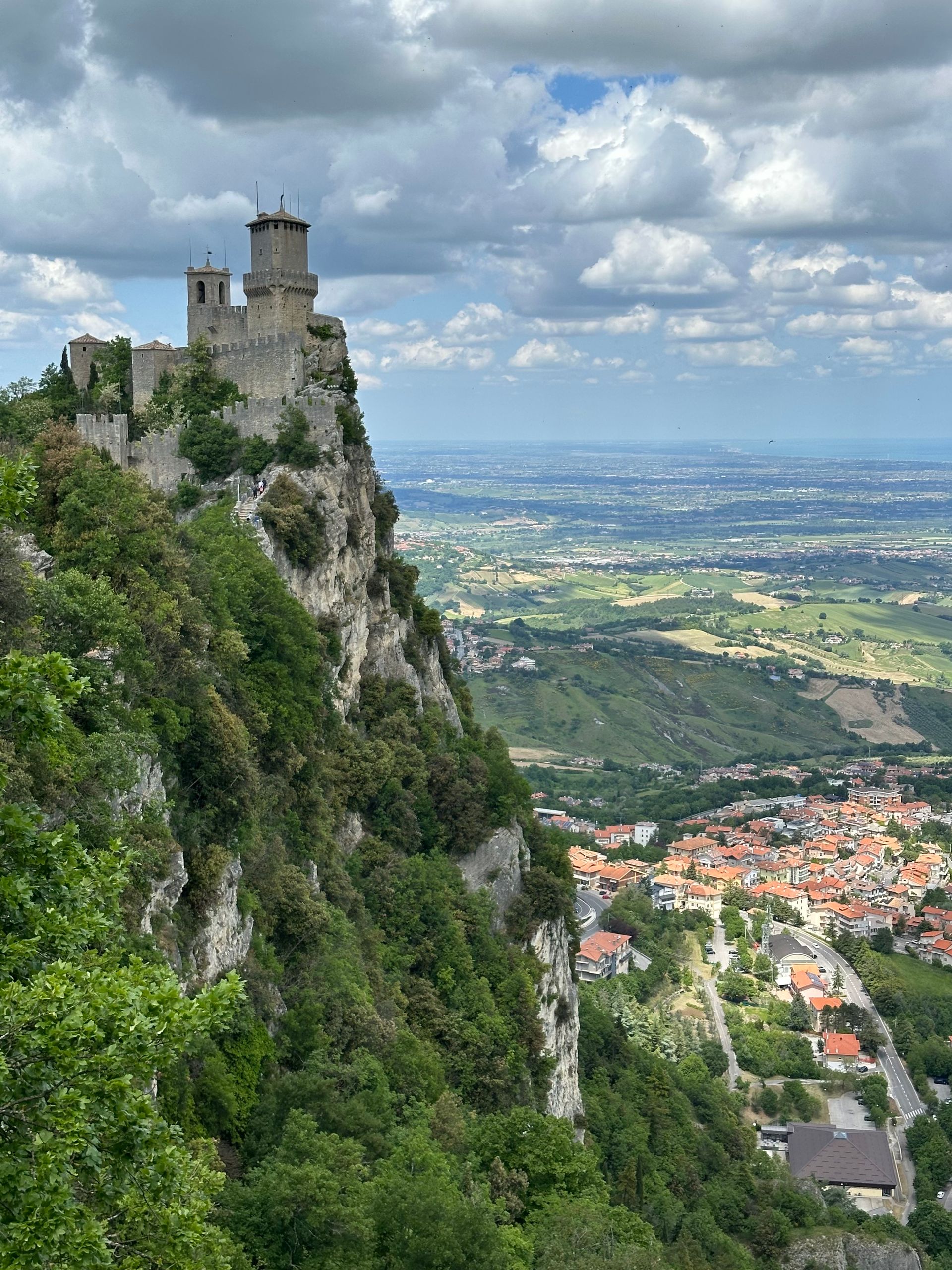 Breathtaking view of the Guaita Tower and surrounding landscape in San Marino.