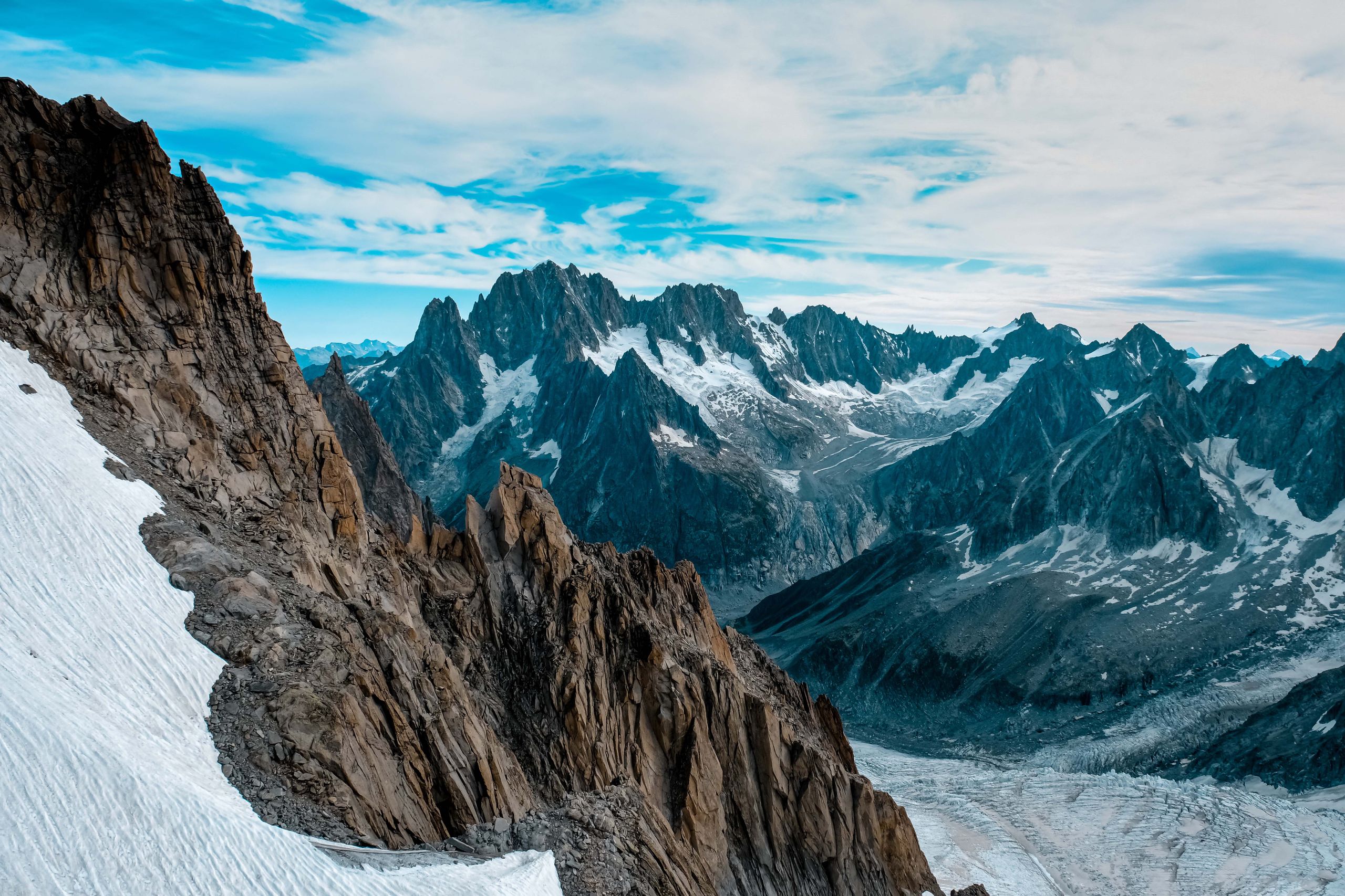Breathtaking winter view of Mont Blanc and rugged peaks in Haute-Savoie, France.